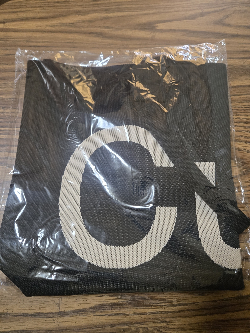 Black Knit Curve Carry Bag with White Lettering